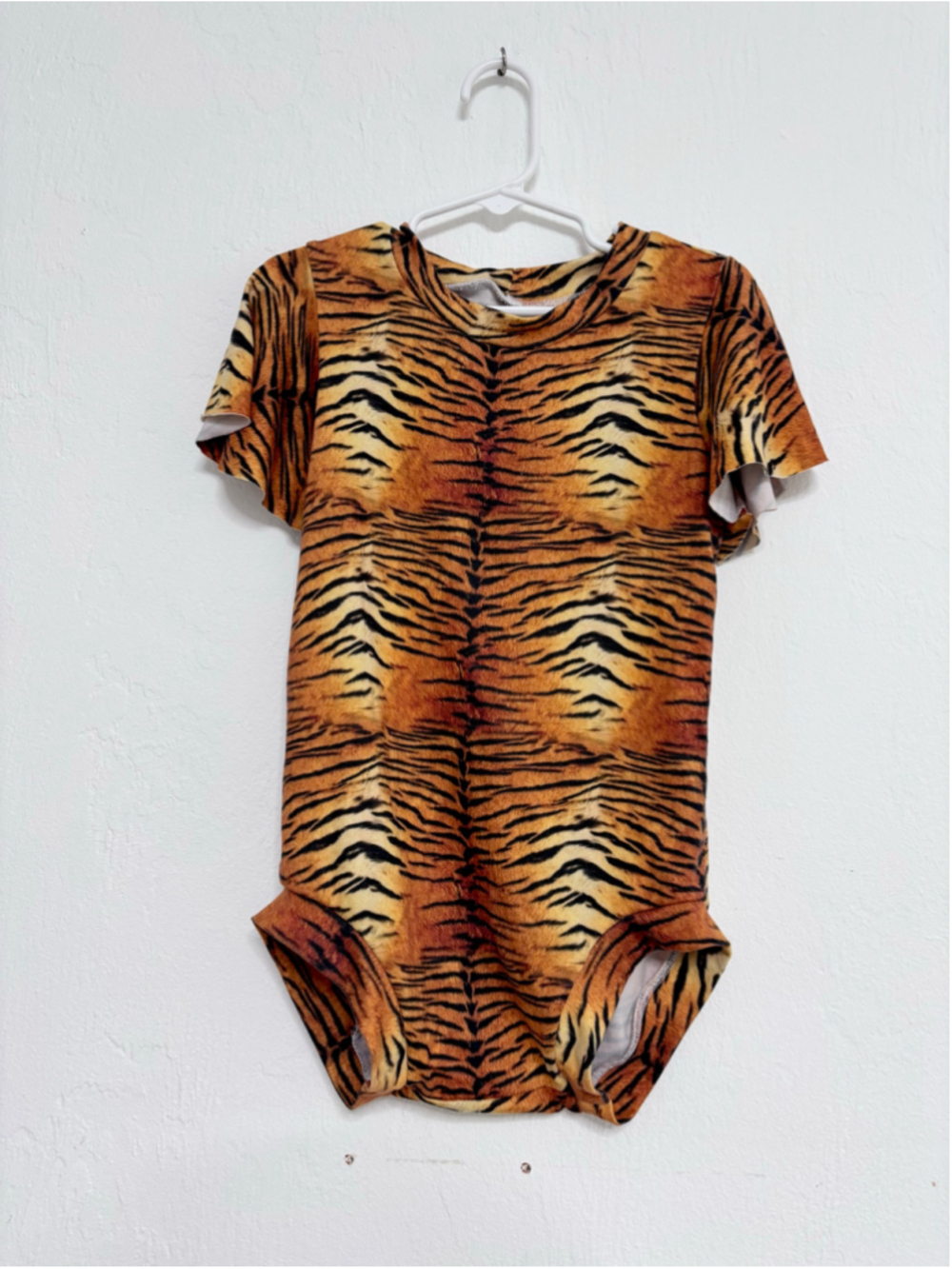 Girl’s Unbranded Tiger Print Romper size 6/7 Orange Black stretch